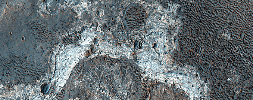 Light-Toned Outcrops in Plains between Melas and Candor Regions