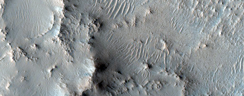 Outflow of Crater with Nili Fossae Fan and Phyllosilicates