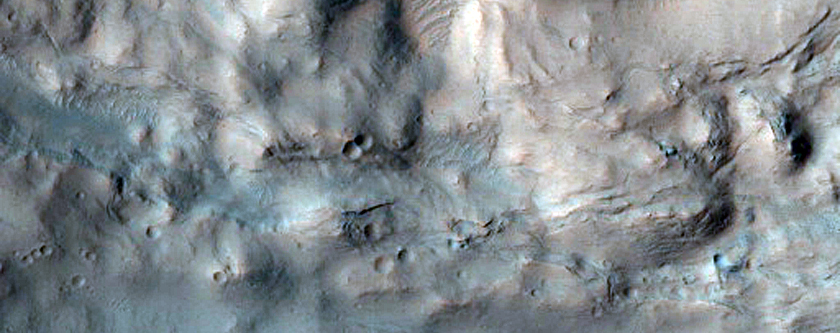 Pits at the Head of Dao and Niger Valles as Seen in MOC Image E04-00791