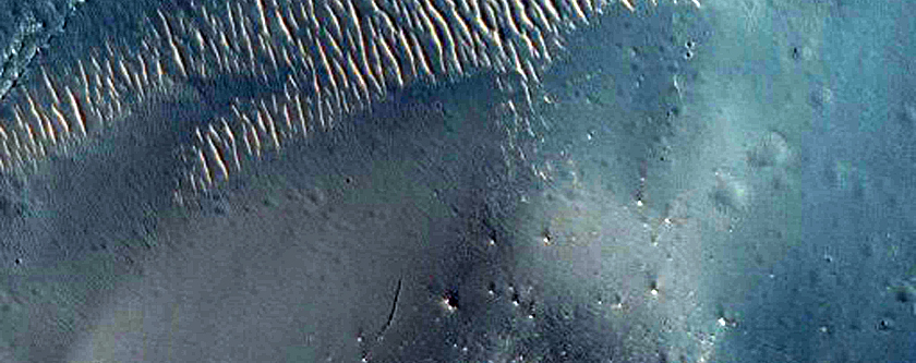 Crater with Layered Deposits and Increase in Hydration in Arabia Region