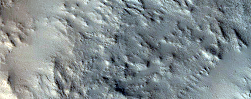 Slope Streaks and Material Slumping