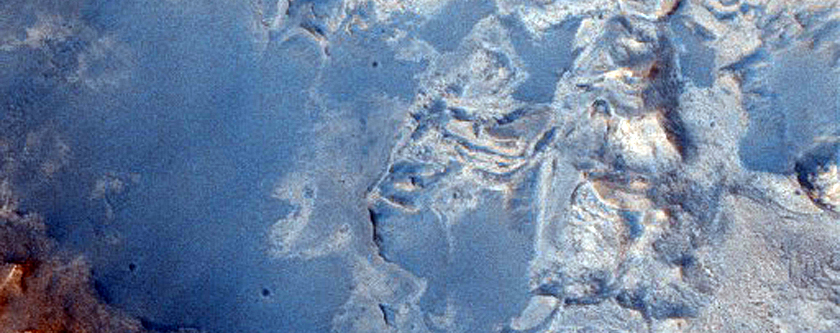 Kibukkant kőzetréteg egy, a Meridiani Planum-tól északra lévő kráterben