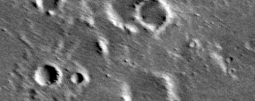 Crater Surrounded by Margin of Gigas Sulci Material