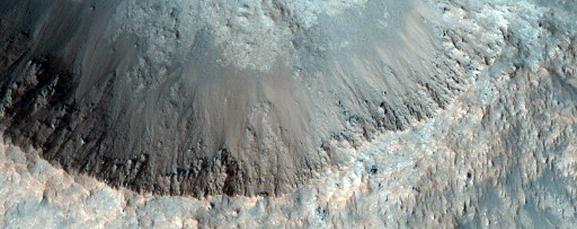 Crater with Light-Toned Floor and Ejecta Material Near Iani Chaos