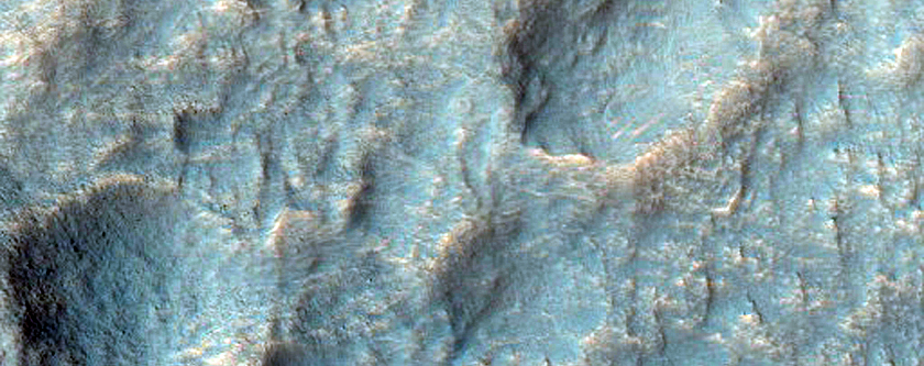 Very Fresh Small Crater on Floor of a Large Crater Rich in Kaolinite