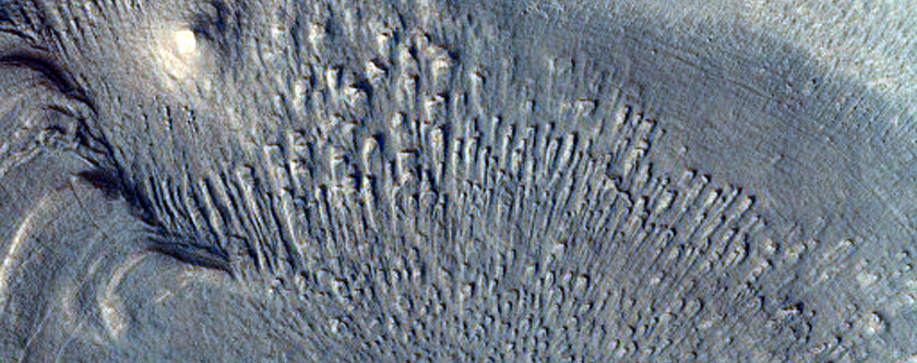 Layers in Floor of Small Crater