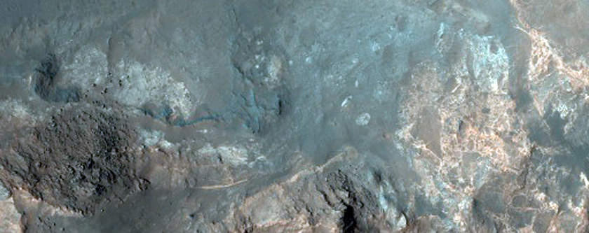 Megabreccia Deposits in Uzboi Vallis-Holden Crater Breech