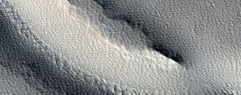Channels and Troughs in Southwestern Elysium Rise