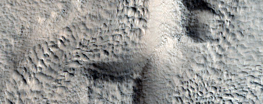 Channel and Possible Deposit in Cerulli Crater in Deuteronilus Mensae