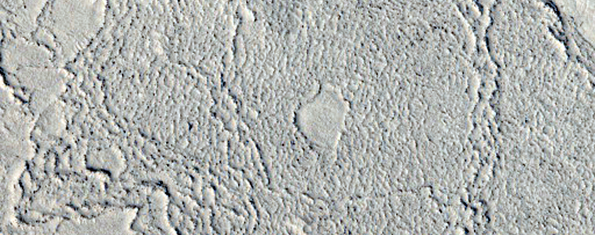 Interaction between Platy-Ridged Lava and Older Hill