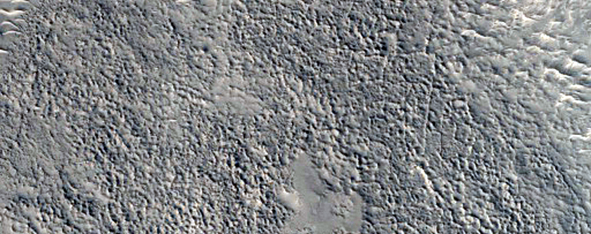 Layered Material Exposed on Crater Floor