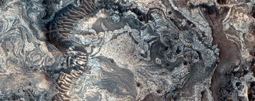Valleys and Layering along Melas Chasma