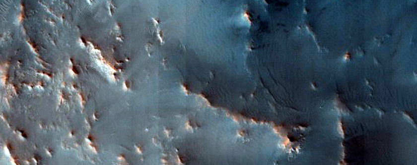 Central Uplift of an Impact Crater Near Coloe Fossae