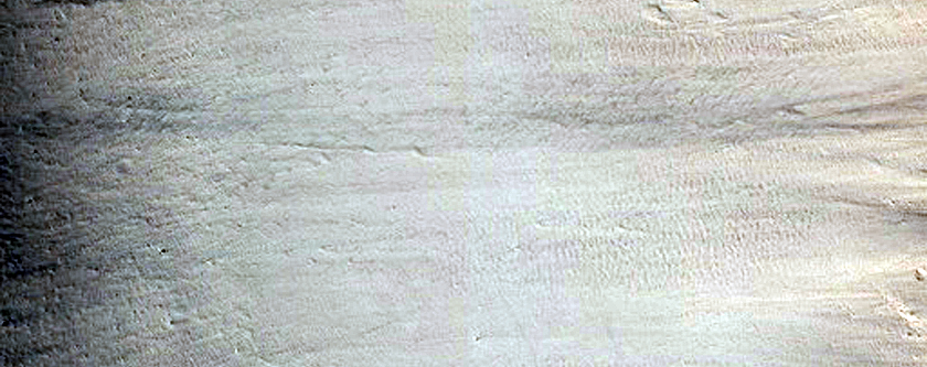 Triple Intersection of Three Different Terrains in Acheron Fossae
