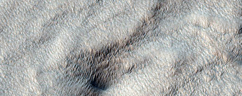 Pit with Layered Walls in Mid-Latitude Mantling Unit