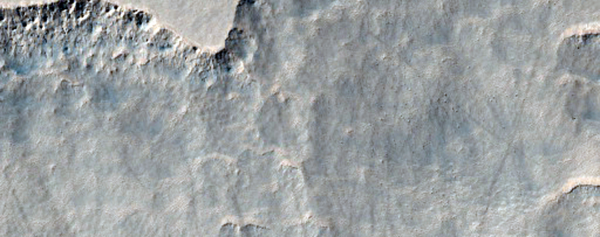 Scalloped Terrain in Mid-Latitude Mantle at Peneus Patera