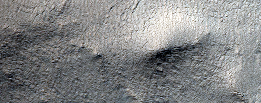 Pits along Scarp within South Polar Layered Terrain