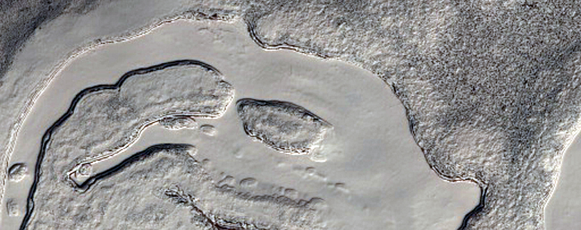 South Polar Residual Cap Monitoring: Rare Stratigraphic Contacts