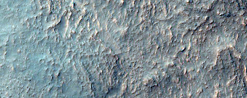 Layered Bedrock in Pit on Crater Floor in Noachis Terra