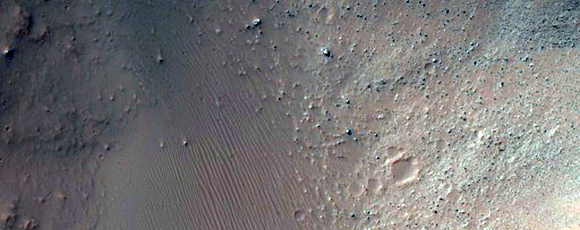 Fresh 4-Kilometer Diameter Crater on the Eastern Margin of Hesperia Planum