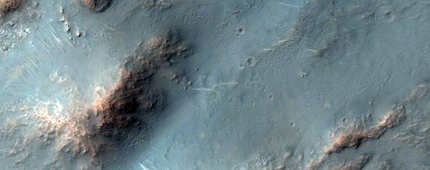 Central Peak and Interior of a Well-Preserved 16-Kilometer Diameter Crater