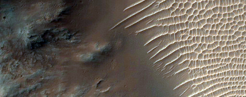 Big Rocky Central Peak of a Large Crater Adjacent to Herschel Crater