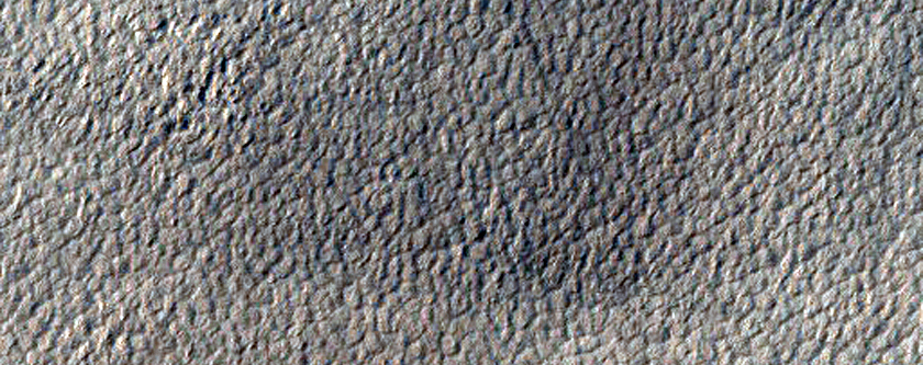 Depressions within Mantling Unit on Knobs in Promethei Terra