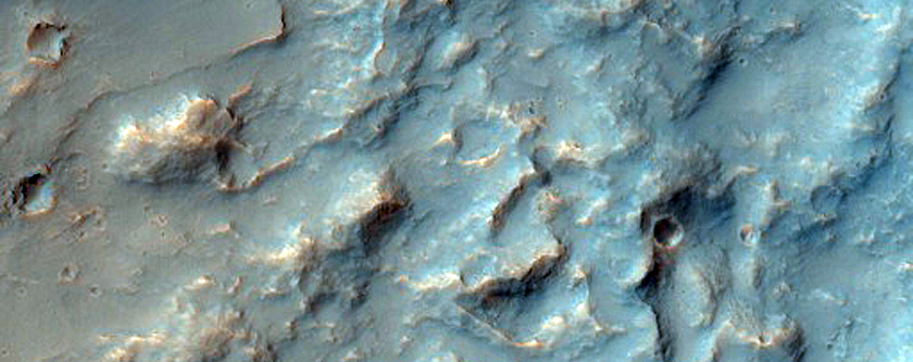 Possible Phyllosilicate in Crater Excavating Dark Material