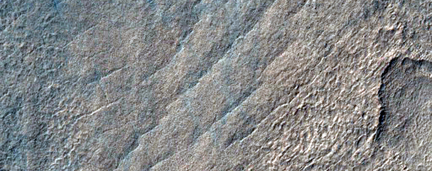 Perplexing Landforms in Beloha Crater