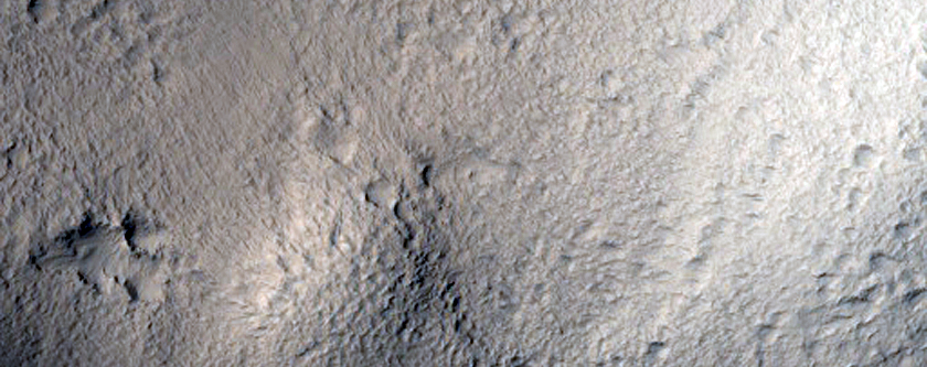 Trough and Flows in the Cerberus Fossae Region