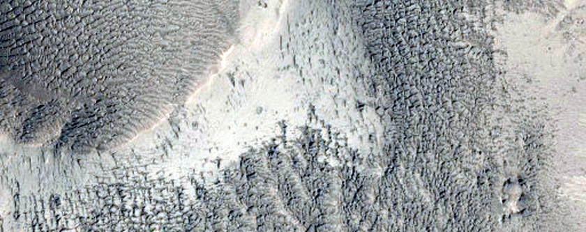 Impact Crater in Medusae Fossae Formation in Memnonia Sulci