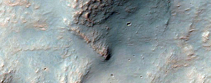 Exposures of Layered Bedrock North of Hellas Basin