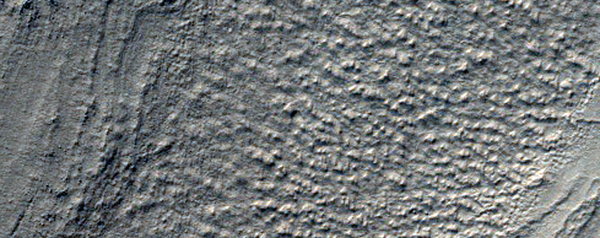 Complex Banded Flow Terrain on Floor of Hellas Basin