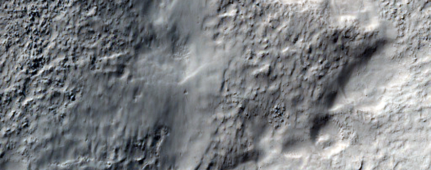 Central Uplift of a 100-Kilometer Diameter Impact Crater