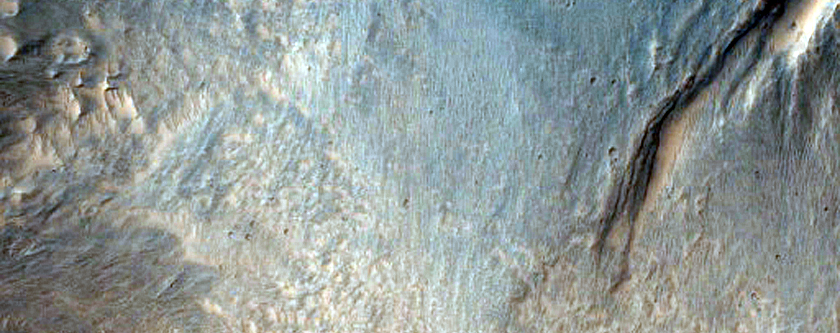 Drainage Off a Large Terrace Pond in Southern Mojave Crater