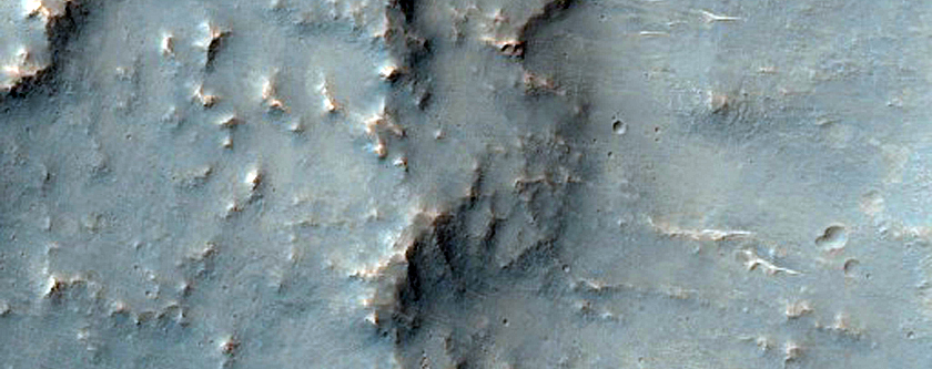 Layered Ejecta and Rays of 5-Kilometer Diameter Crater Near Ophir Catenae