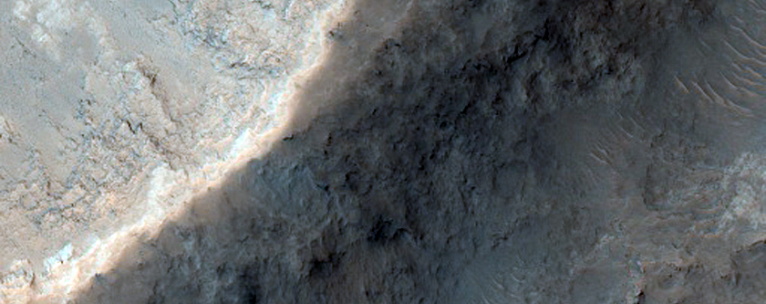 Layers Exposed in Wall of Crater in the Floor of Hydaspis Chaos