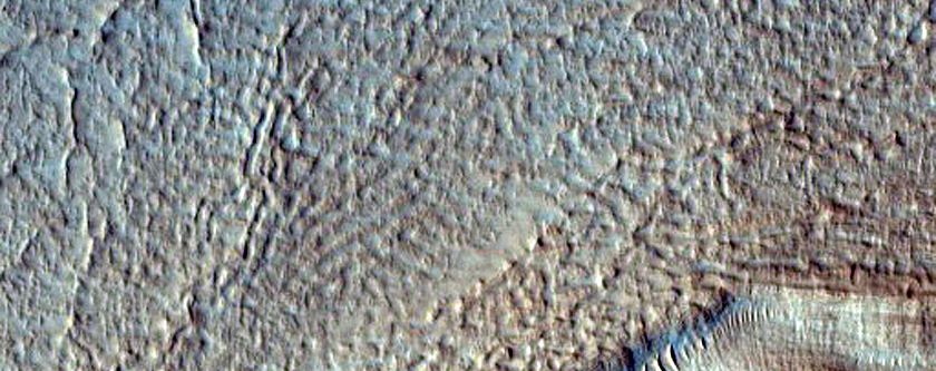 Crater with Arcuate-Ridged Interior Material