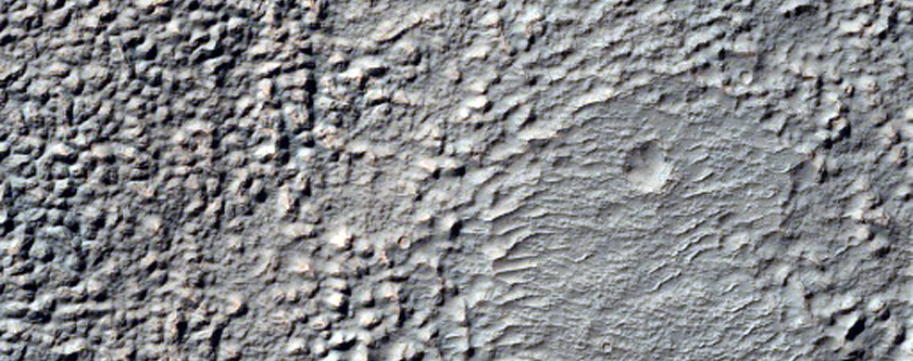 Southern Edge Valleys of Thaumasia Region Plateau Near Coracis Fossae