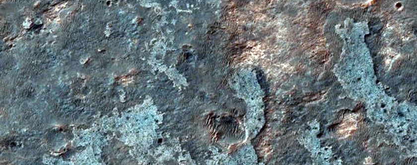 Light-Toned Material along Plains Southwest of Juventae Chasma