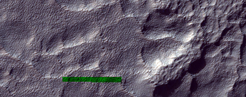 Fretted Terrain-Like Apron Material East of Hellas Planitia