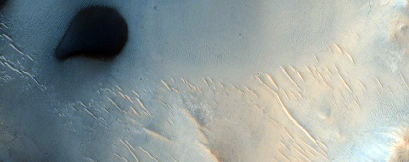 Small Dunes and Material in Peridier Crater