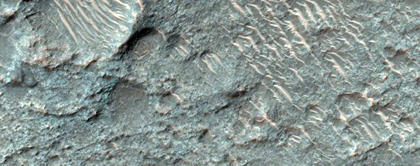 Infrared Bright Crater Floor with Low Albedo in Hesperia Region