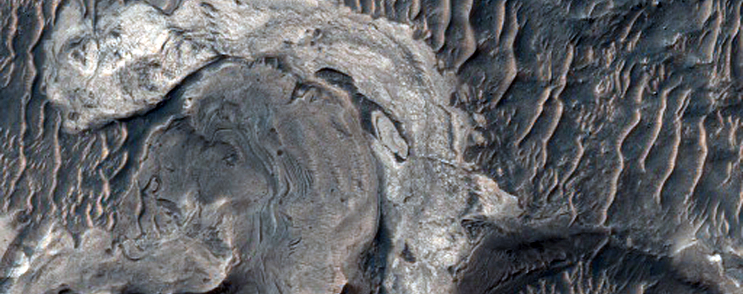 Geologic Contact Between Landslides and Blocky Deposit on Floor of Melas Ch