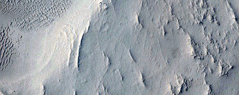 Pitted Area East of Indus Vallis with Slope Streaks