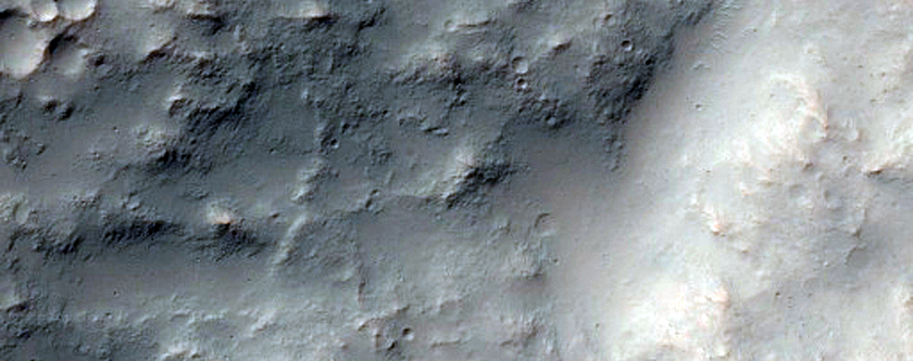 Gullies on Steep Slopes of Two Well-Preserved Large Craters