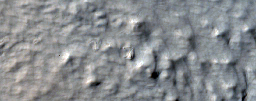 Ridges and Fill Material Among Knobs on West Flank of Arsia Mons