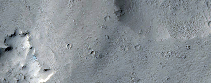 Crater Cluster and Yardangs on Mesas
