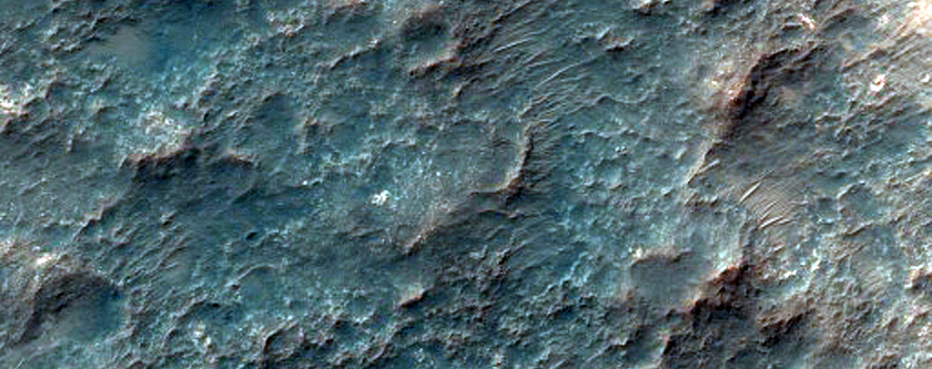 Toe of Alluvial Fan and Megabreccia-Rich Floor of Large Impact Crater