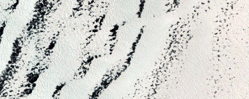 Persistent Northern Plains Ice Deposit Leeward of Crater